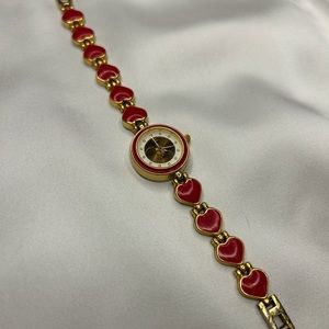 Dainty vintage watch with red hearts
